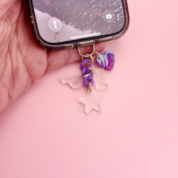 Détail grigri téléphone cœur galaxie étoile pastel