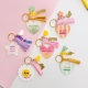 Collection de porte-clés enfant à messages positifs pour cartable et trousse