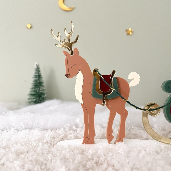 Renne en plexiglas, village miniature de Noël