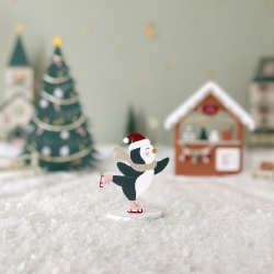 Village de Noël miniature et poétique, pingouin patin à glace