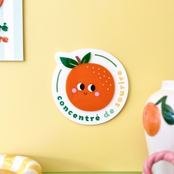 Décoration murale en forme d’orange avec message Concentré de sourire